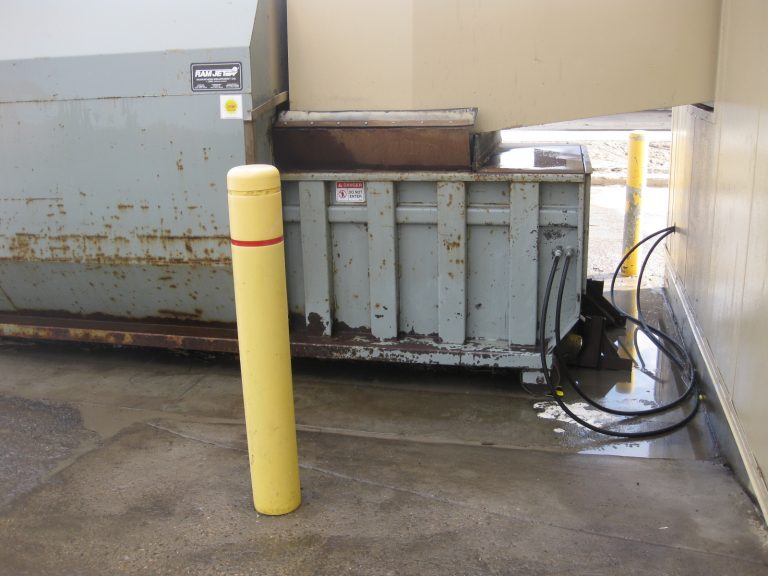 Pressure cleaned compactor Pressure cleaned compactor